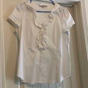 White ruffled blouse